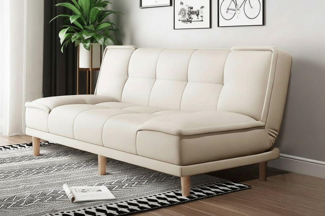 Beige sofa in a room with decorative elements and text on it.