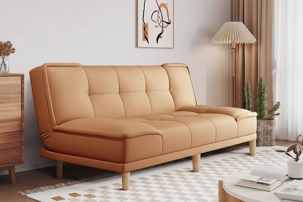 Beige sofa in a living room setting with decor elements.