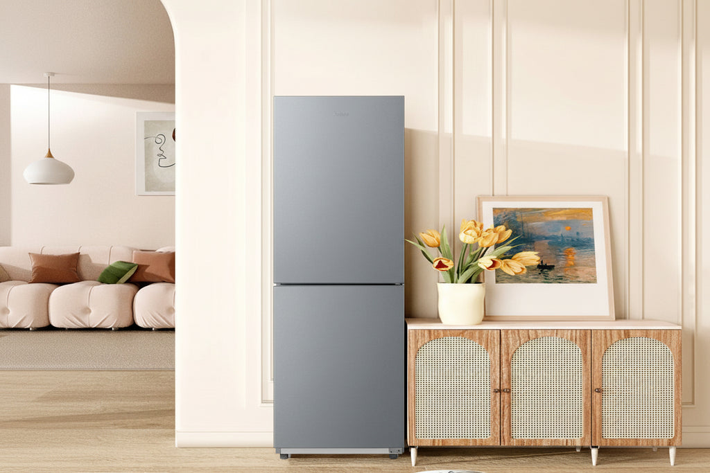 Modern refrigerator in a living room setting with decorative elements.