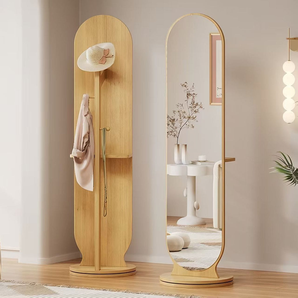 Wooden standing mirror with a cabinet in a room setting