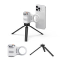 Phone holder with mini tripod and smartphone on a white background