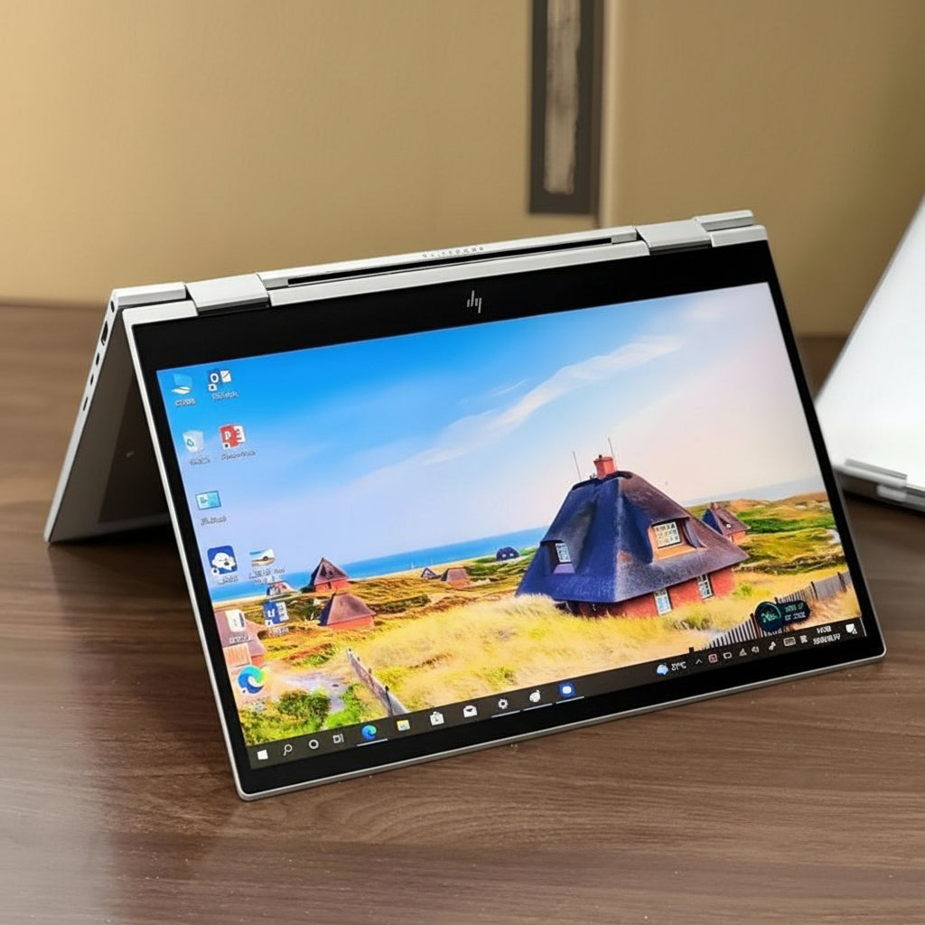 HP EliteBook X360 830 G7 laptop on a wooden surface with a scenic display.