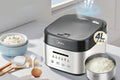 Midea electric pressure cooker with text on a gray background