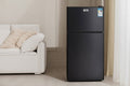 Black refrigerator with promotional text on a light-colored wall background